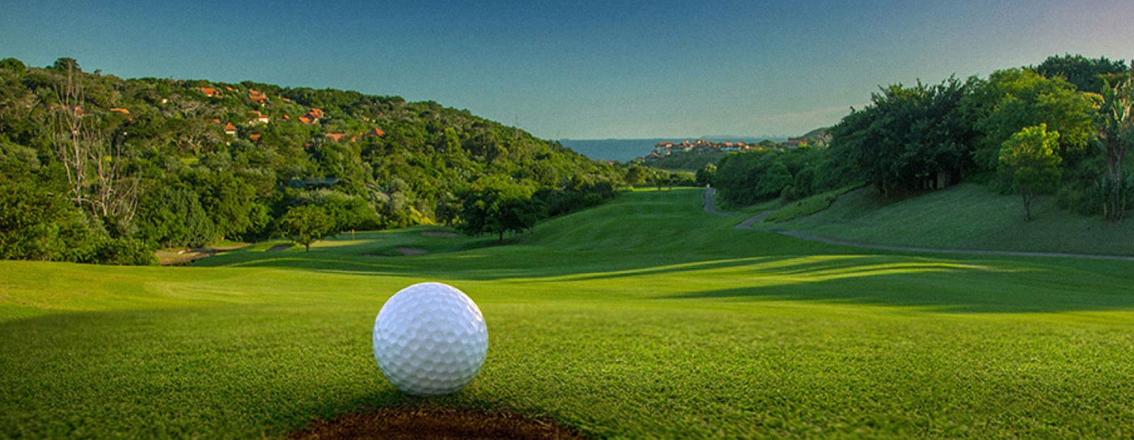 Golf ball facing down the a green at Zimbali